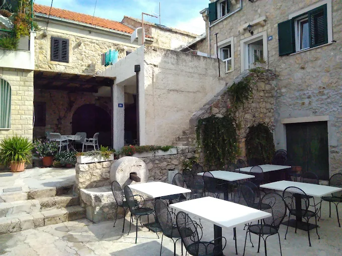 Outdoor terrace in stone courtyard